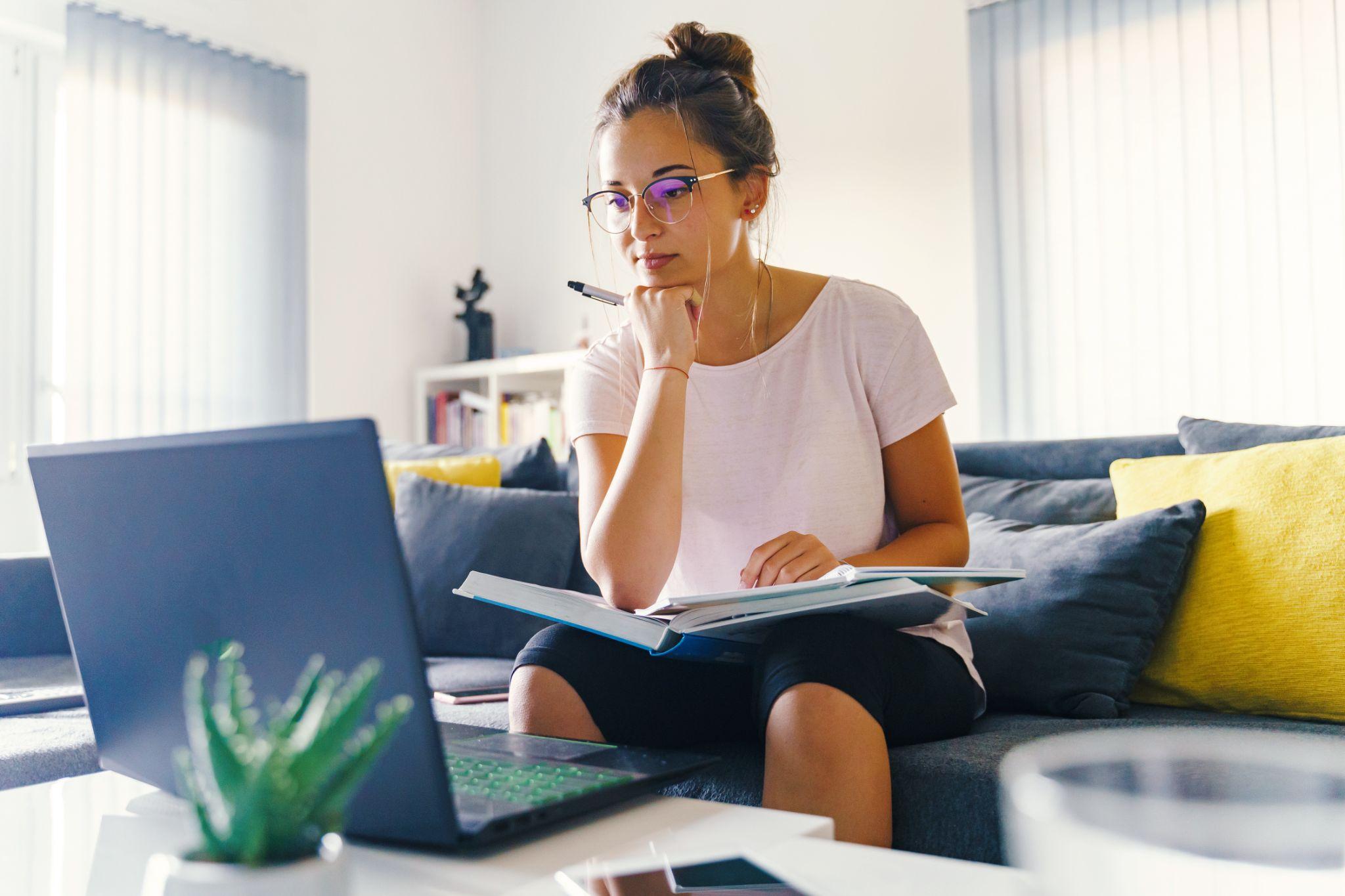 An image of a woman concentrating on SAP ERP software training.